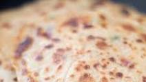 Paratha made with a liquid dough Paratha made with a liquid dough
