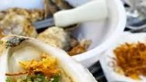 Chilled oysters with Thai seafood sauce (nam jim seafood) and crispy shallots Chilled oysters with Thai seafood sauce (nam jim seafood) and crispy shallots