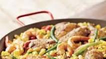 Paella a la Valenciana Paella a la Valenciana