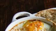 Baked eggs with ham and tomato Baked eggs with ham and tomato