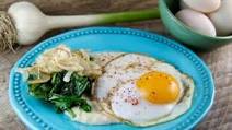 Savory Breakfast Polenta with Eggs, Sautéed Onions, and Spinach Savory Breakfast Polenta with Eggs, Sautéed Onions, and Spinach