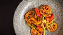 Lotus root with asparagus and peppers Lotus root with asparagus and peppers