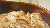 Fish Baked In Creamy Milk Sauce with Onions & Herbs Fish Baked In Creamy Milk Sauce with Onions & Herbs