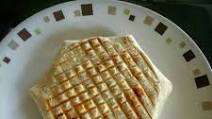 Homemade Steak Crunchwrap Grilled in a Panini Press Homemade Steak Crunchwrap Grilled in a Panini Press