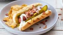 Crispy Ham, Salami, Pickles, and Melted Swiss Cheese Hot Dog Crispy Ham, Salami, Pickles, and Melted Swiss Cheese Hot Dog