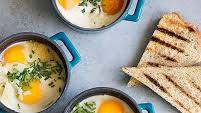 Eggs En Cocotte With Spinach, Pancetta And Parmesan Cheese Eggs En Cocotte With Spinach, Pancetta And Parmesan Cheese