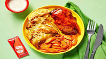 Honey Frank's RedHot® Sauce Chicken with Roasted Carrots & Cheesy Garlic Potato Wedges Honey Frank's RedHot® Sauce Chicken with Roasted Carrots & Cheesy Garlic Potato Wedges