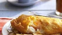 Golden beer-battered fish with chips Golden beer-battered fish with chips
