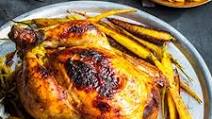 Tandoori roasted chicken with spiced pilaf stuffing and maple curry roasted baby carrots Tandoori roasted chicken with spiced pilaf stuffing and maple curry roasted baby carrots